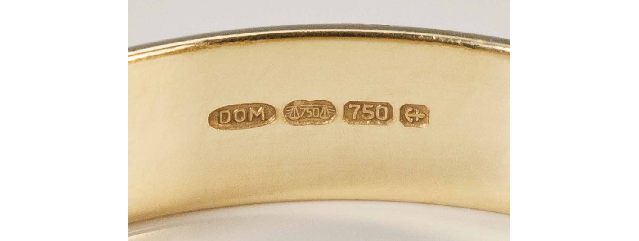 What are the markings on gold jewelry?