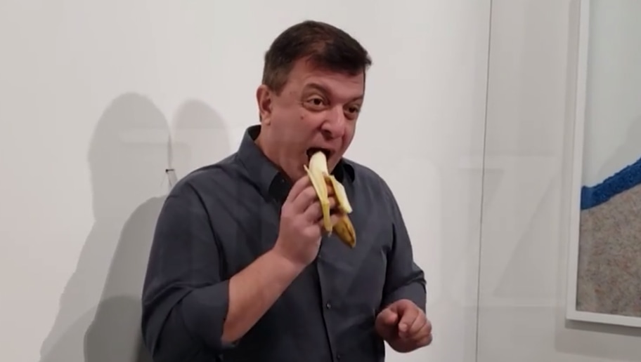 David Datuna Eats 120,000 DuctTaped Banana at Modern Art Exhibit