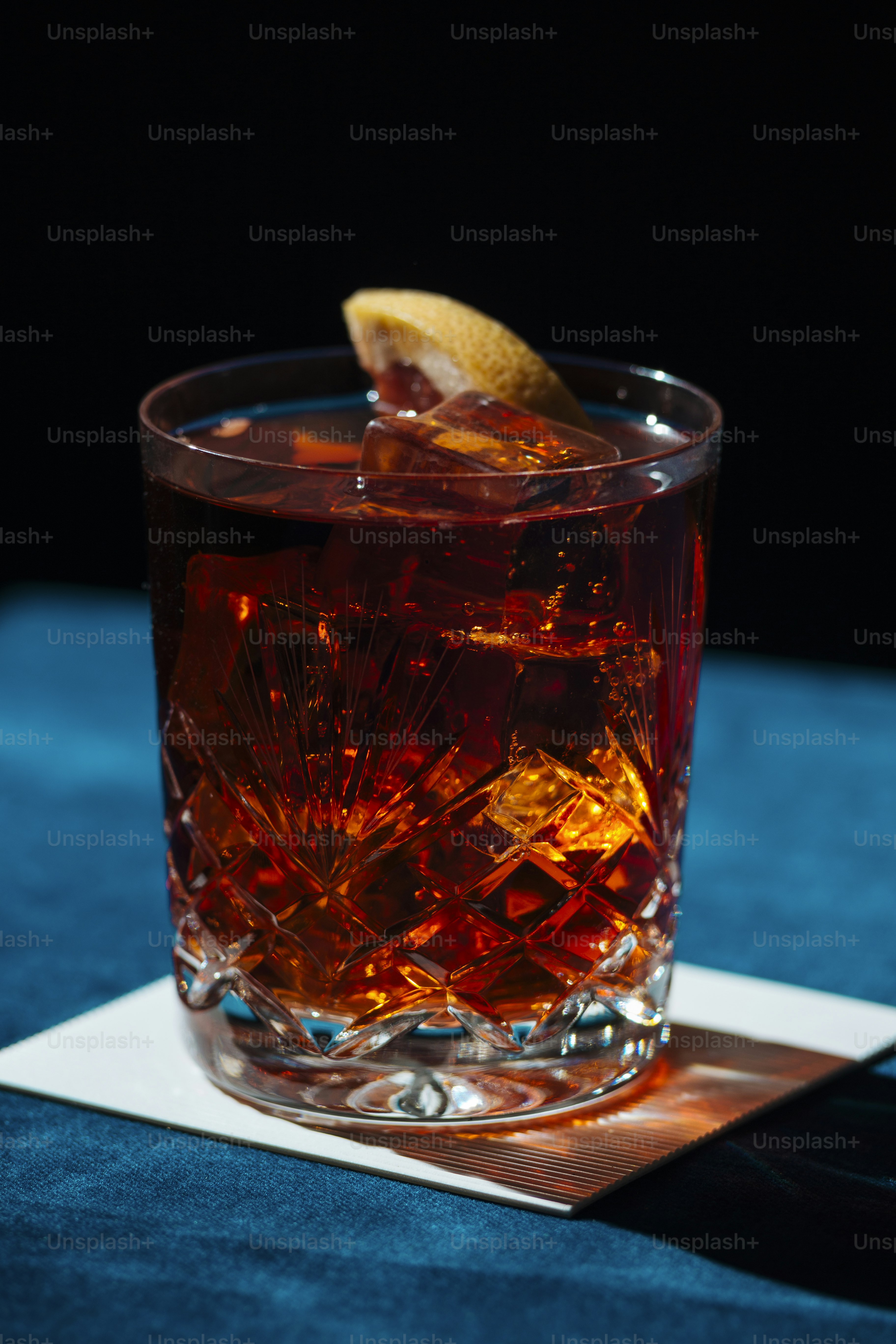 Negroni IBA cocktail, with gin, bitter, vermut, and orance slice