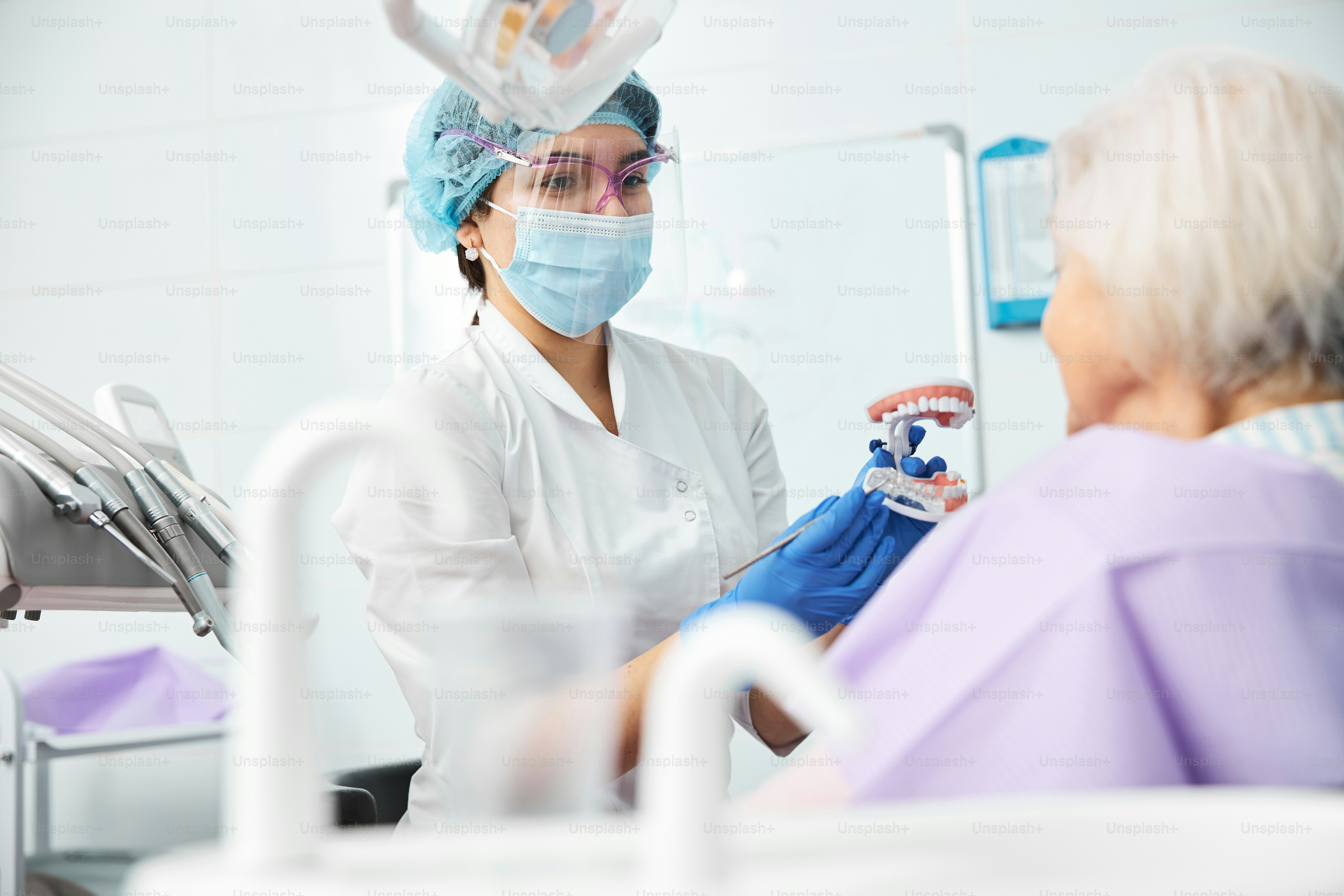 Probe and model of an opened plastic jaw with glass lower teeth used