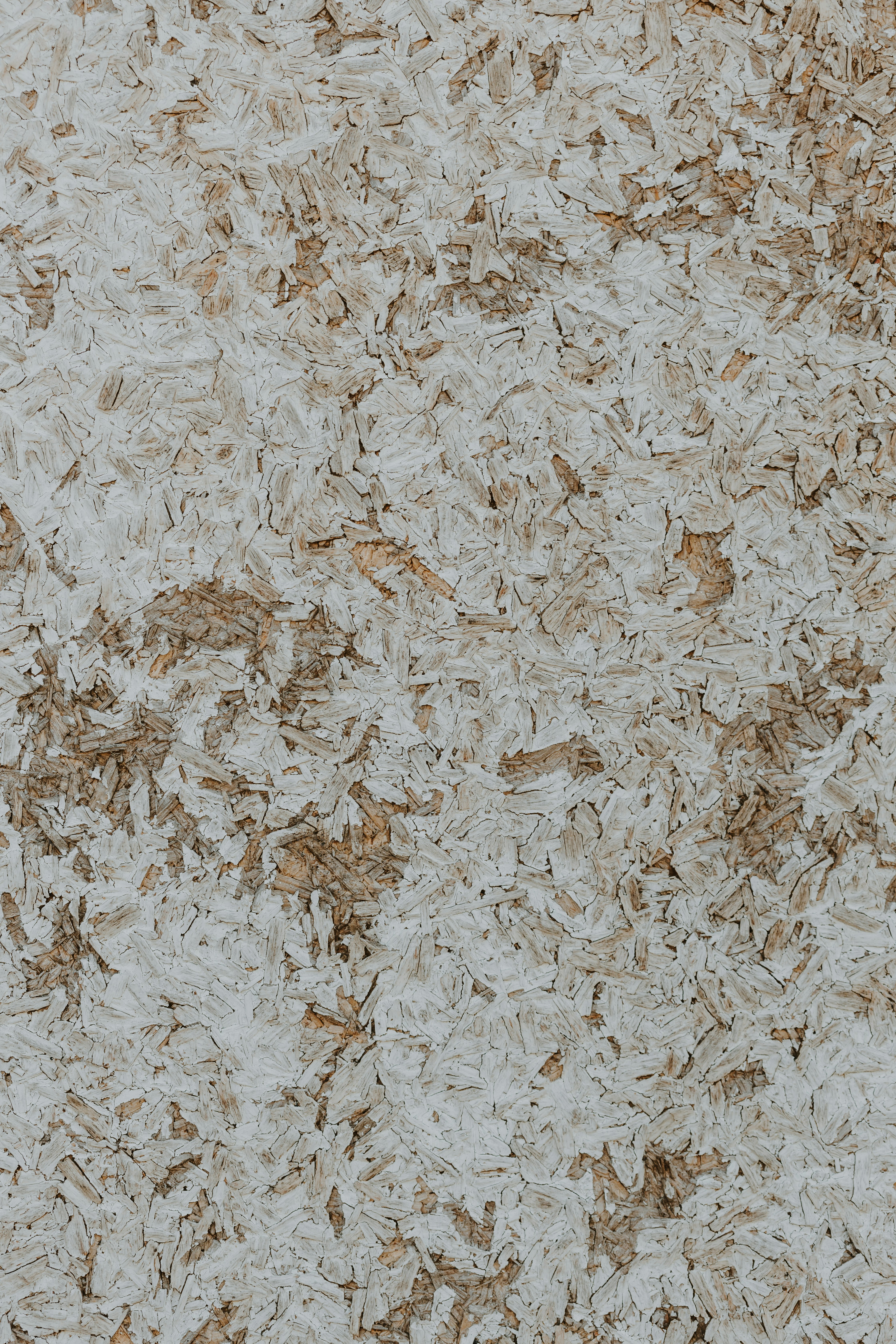 A close up of a white and brown wall photo Texture Image on Unsplash