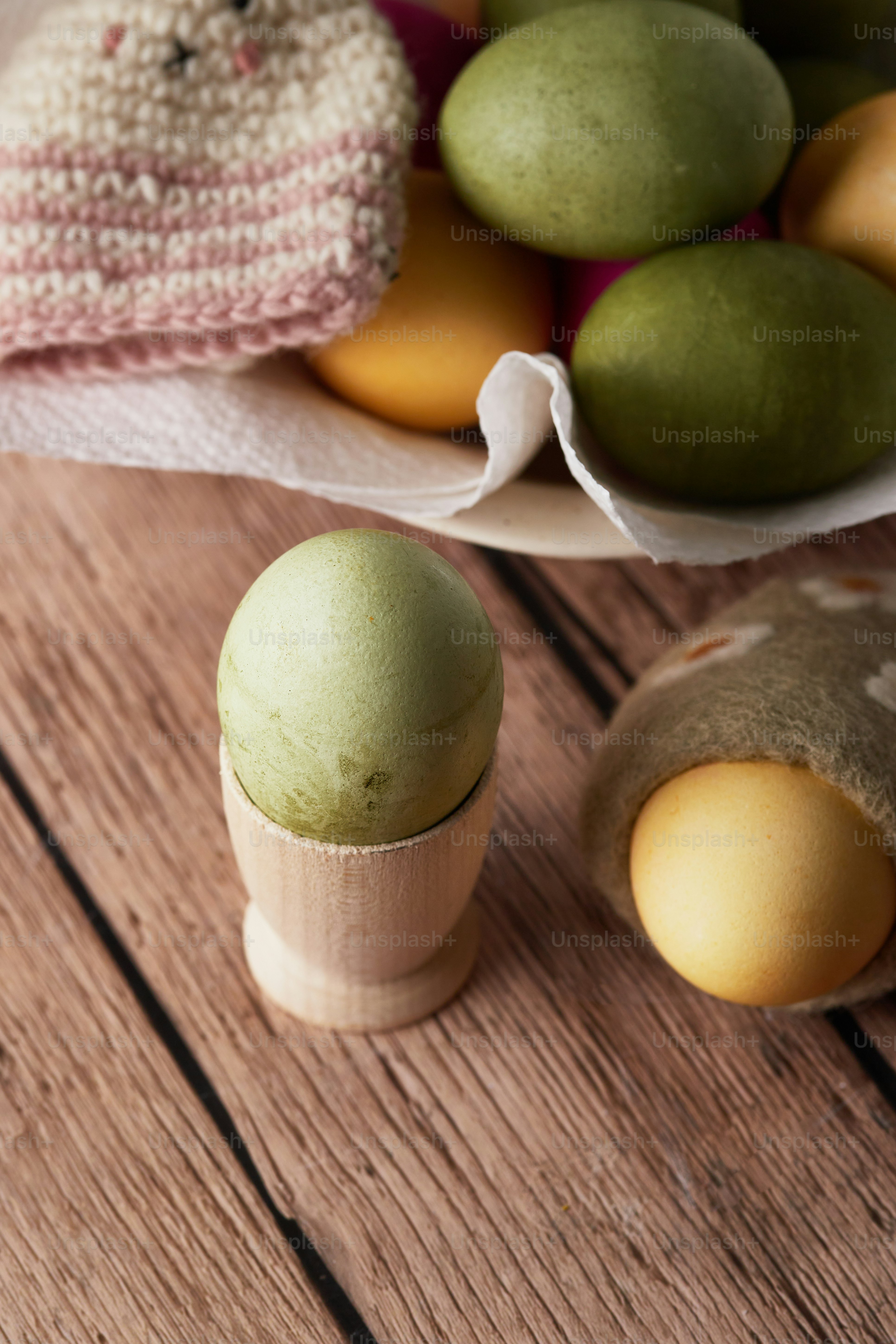 A close up of a bowl of fruit on a table photo Easter decor Image on