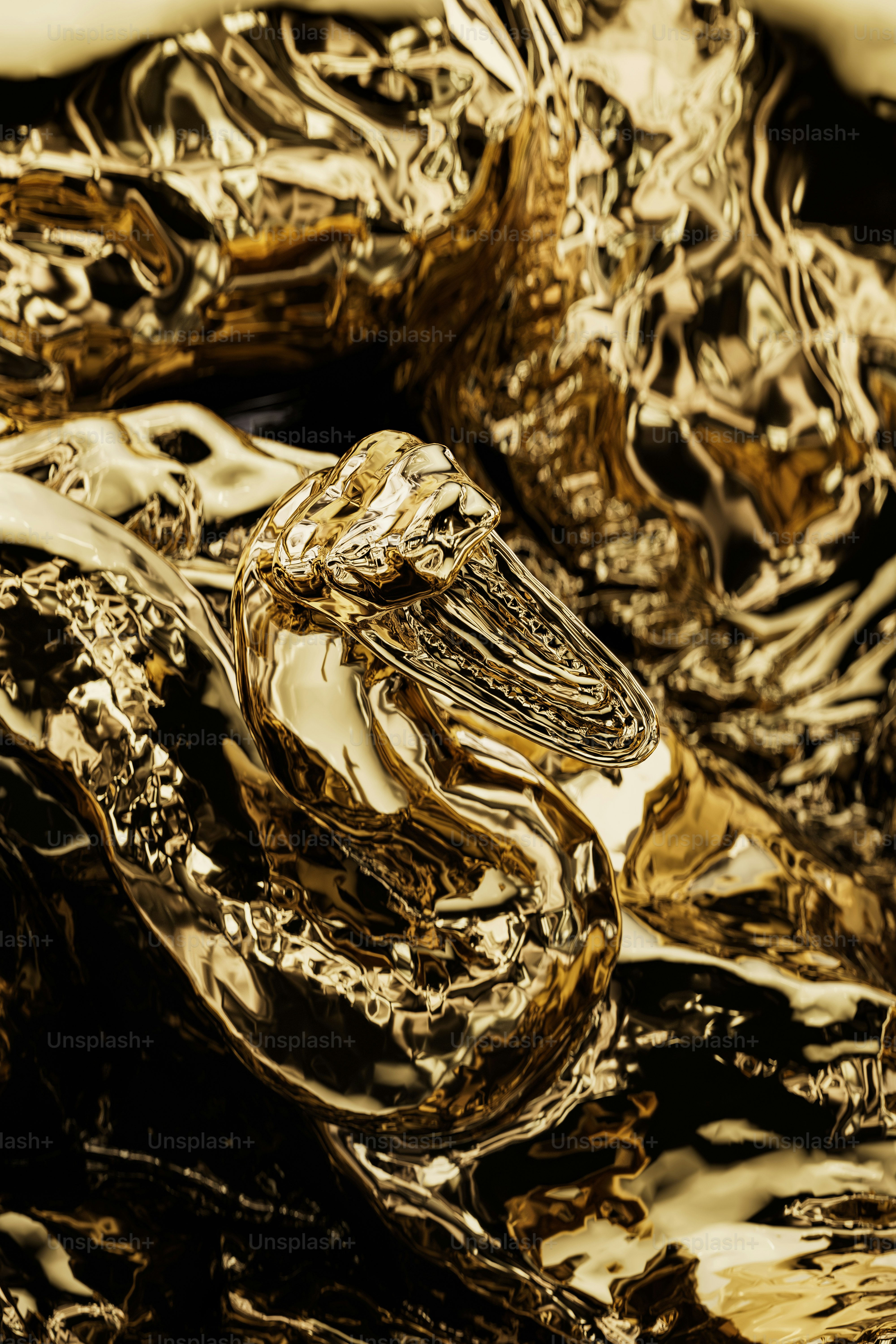 A close up of a piece of gold foil photo Gold Image on Unsplash