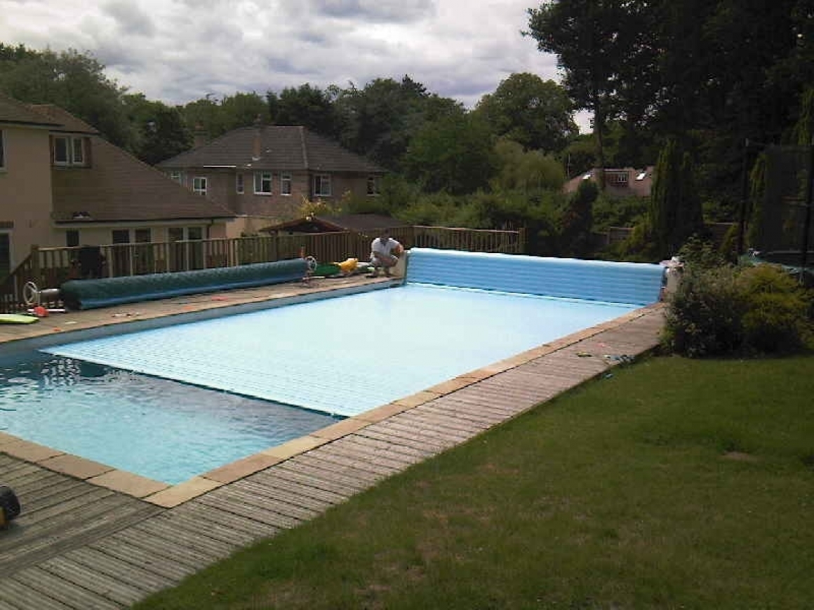 Swimming pool safety covers, slatted pool covers