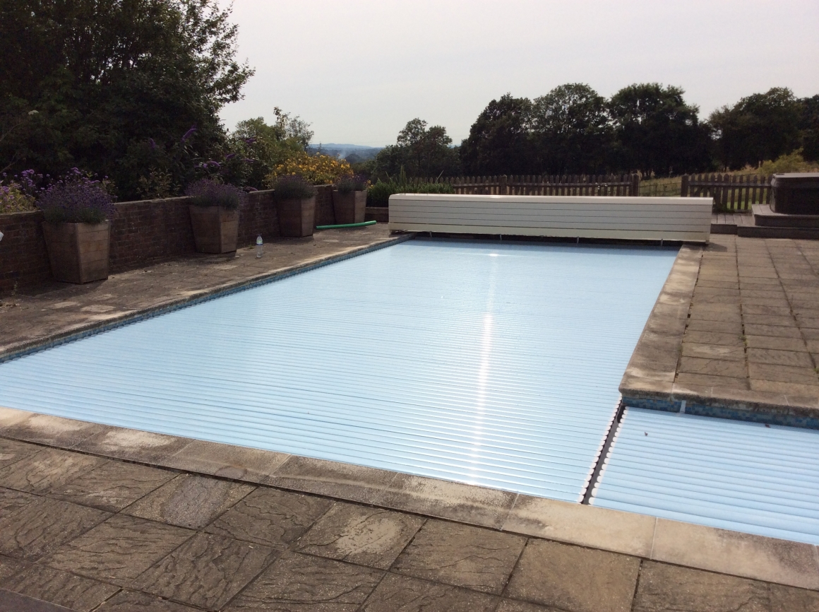Swimming pool safety covers, slatted pool covers