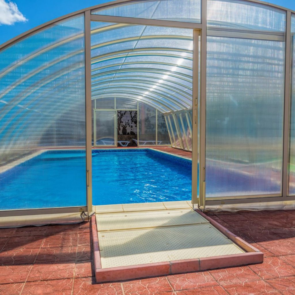 How Pool Enclosures Help Reduce Pool Maintenance Costs? Pool Cost Guide