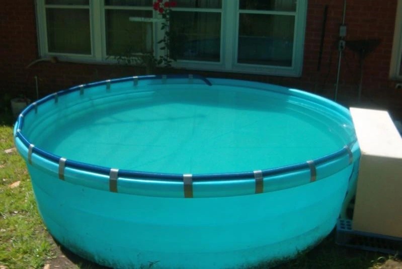 How Warm Does a Solar Cover Heat a Pool? Pool Heaters Guide