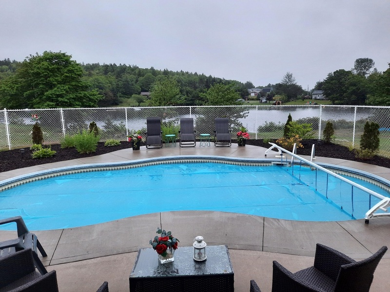 Pool install In ground on ground pool service build refinish Halifax