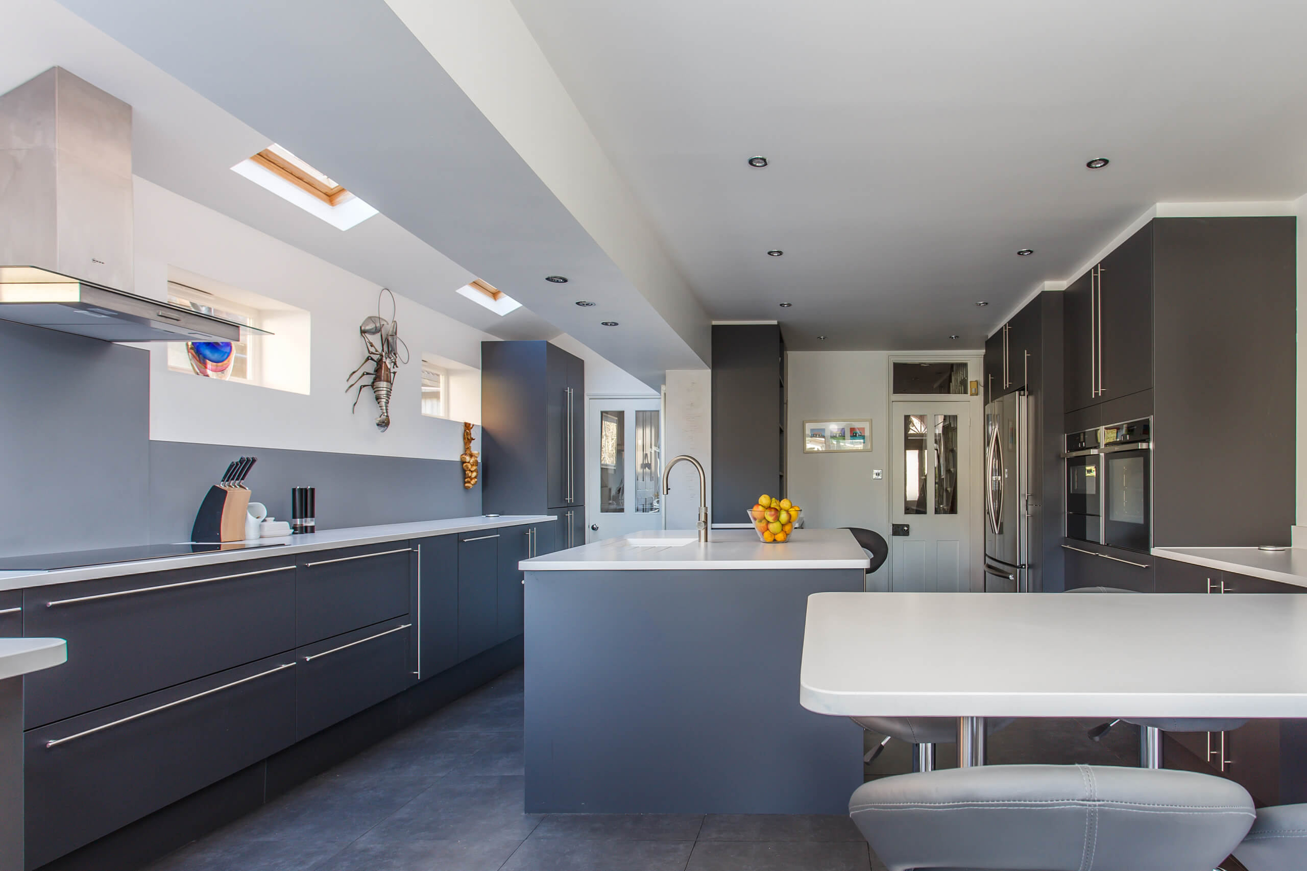 Dark Kitchen for a Light Room Portrait Kitchens