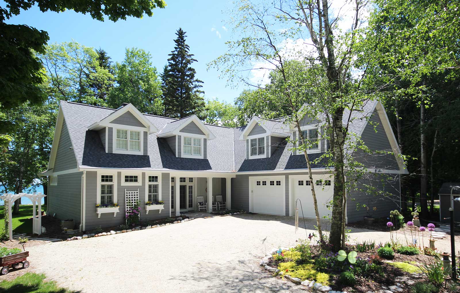 Road view of custombuilt waterfront home in Sturgeon Bay, Wisconsin • PortSide Builders