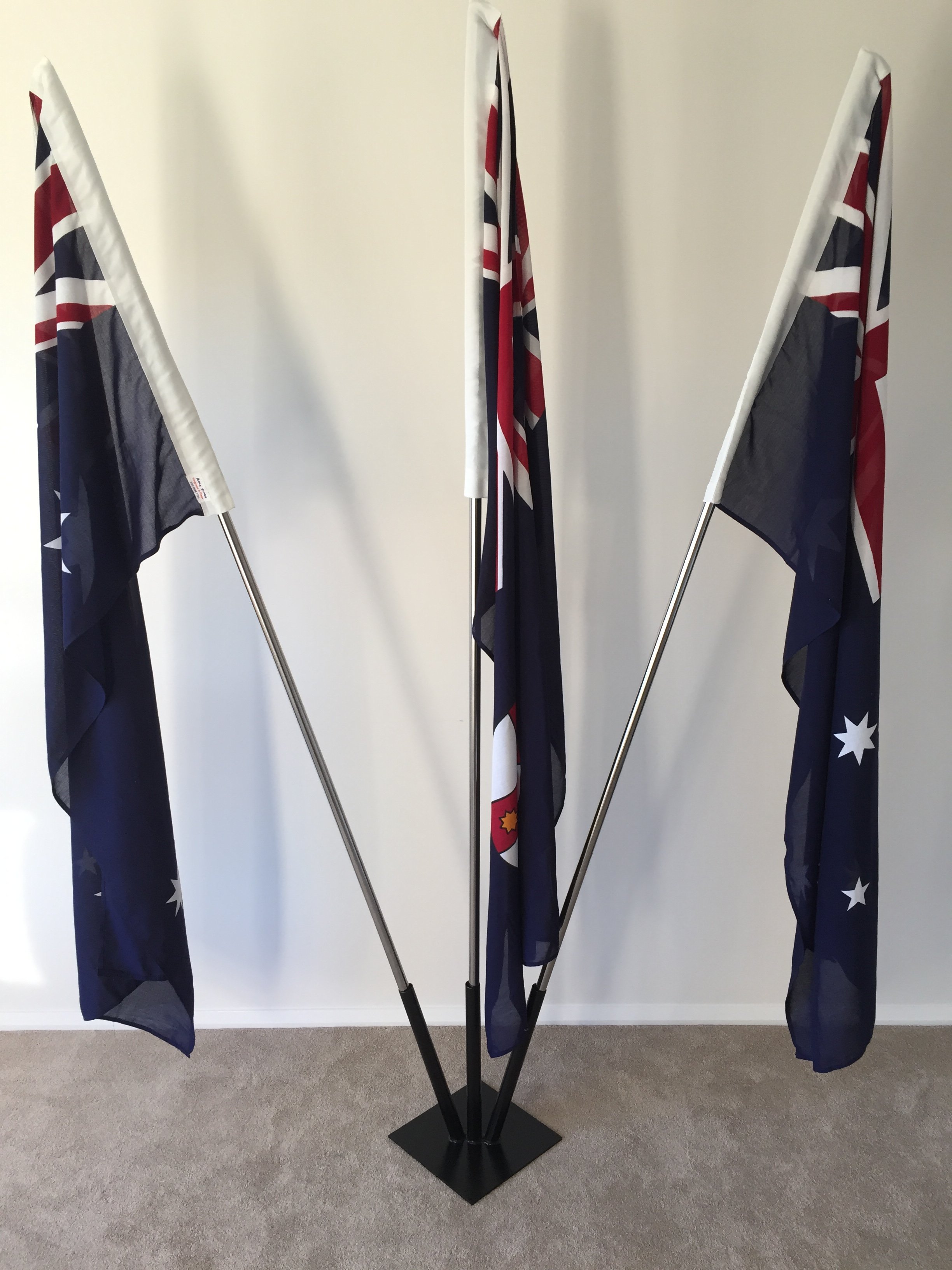 Portable flagpole in stainless steel or timber finish. Poseidon Poles