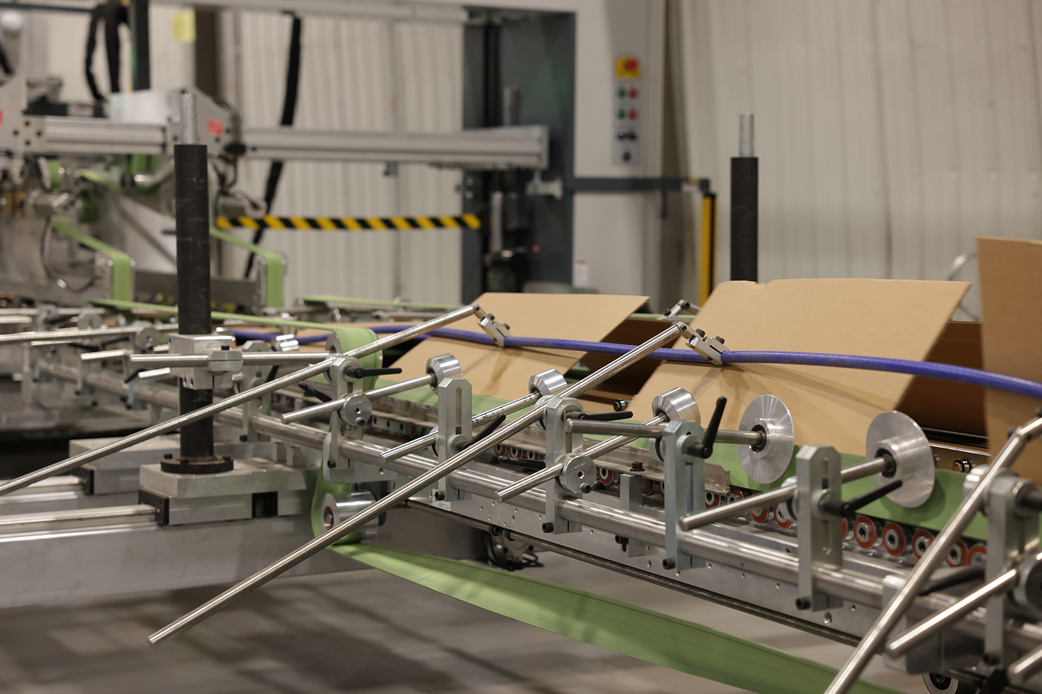 Corrugated boxes in manufacturing plant Premier Packaging