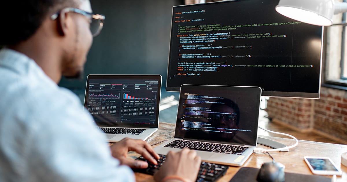 A man coding a website.