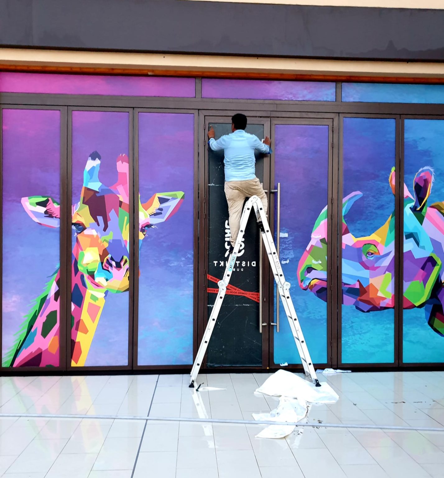 Branding On Hoarding Or Glass Or Wall In Large Format Sticker Printing