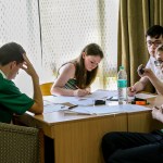 Members of Team Ireland working on problems