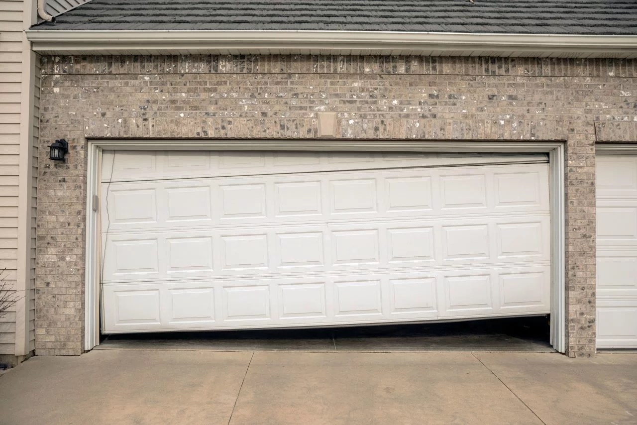 How to Fix Uneven or Sagging Garage Doors Pro Entry Garage Doors