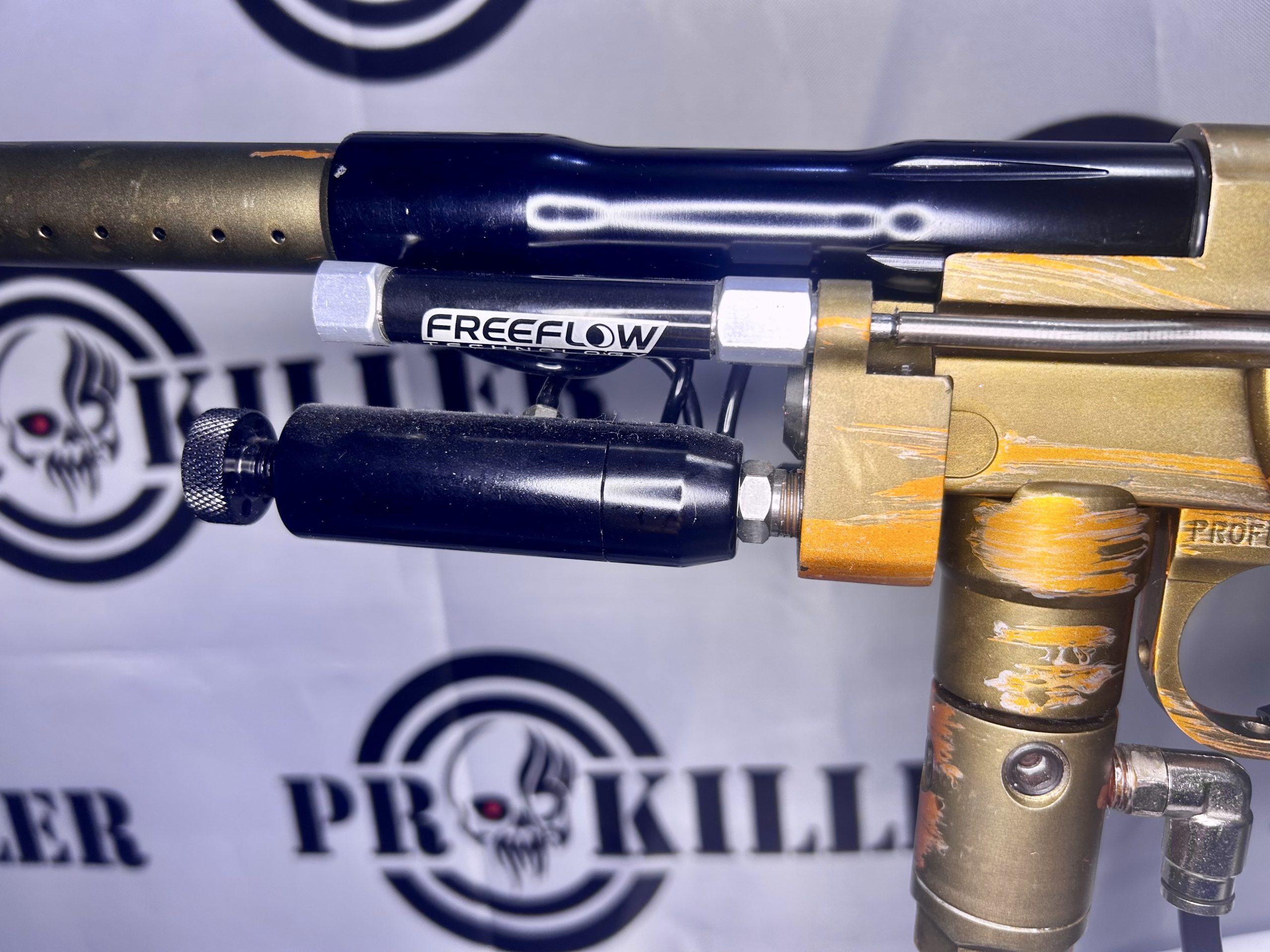 Freeflow Millenium Autococker In Matte Distressed Olive DrabOrange