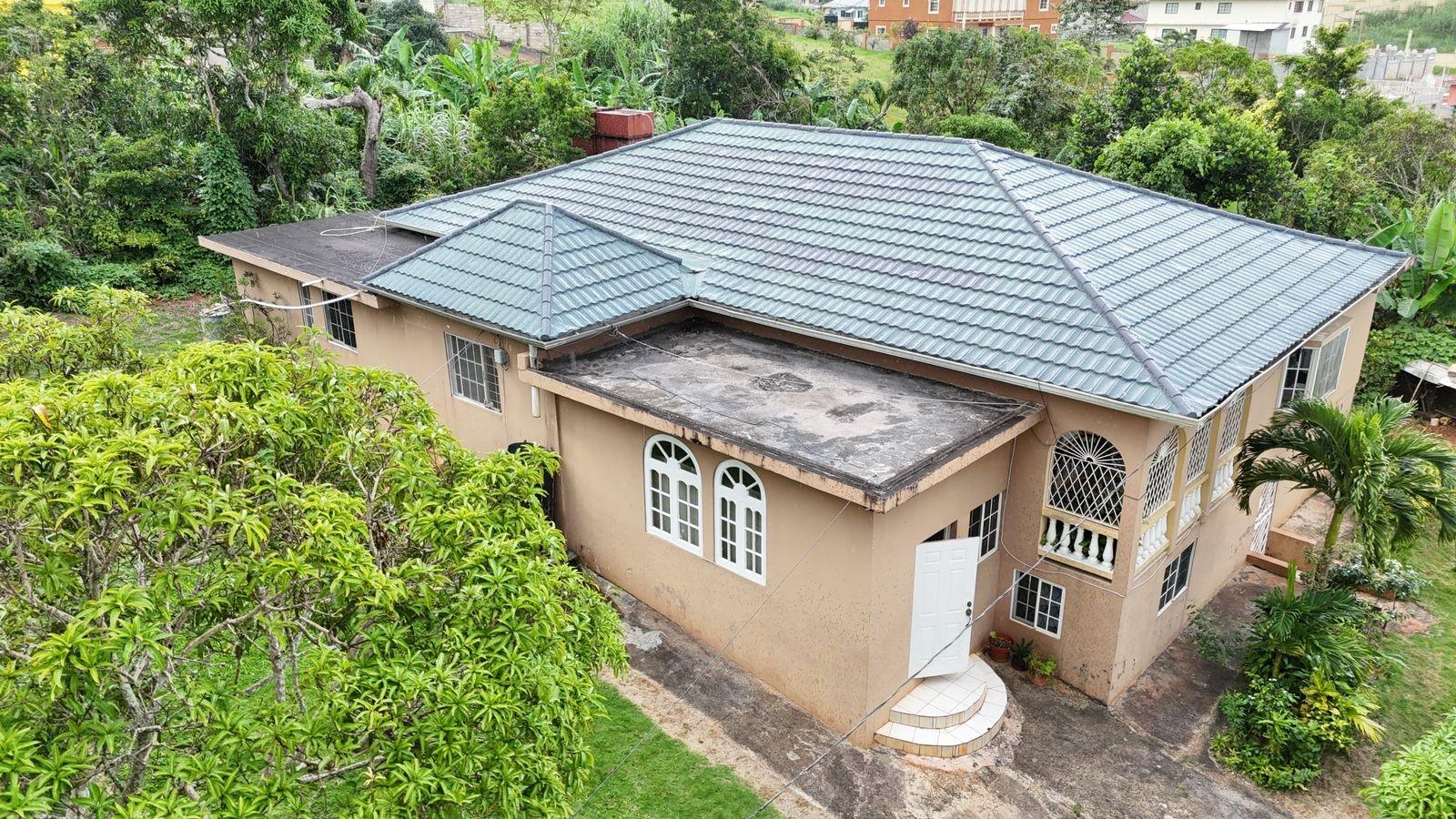 5 Bedroom 4 Bathroom House for sale at Cedar Grove, Manchester, Jamaica