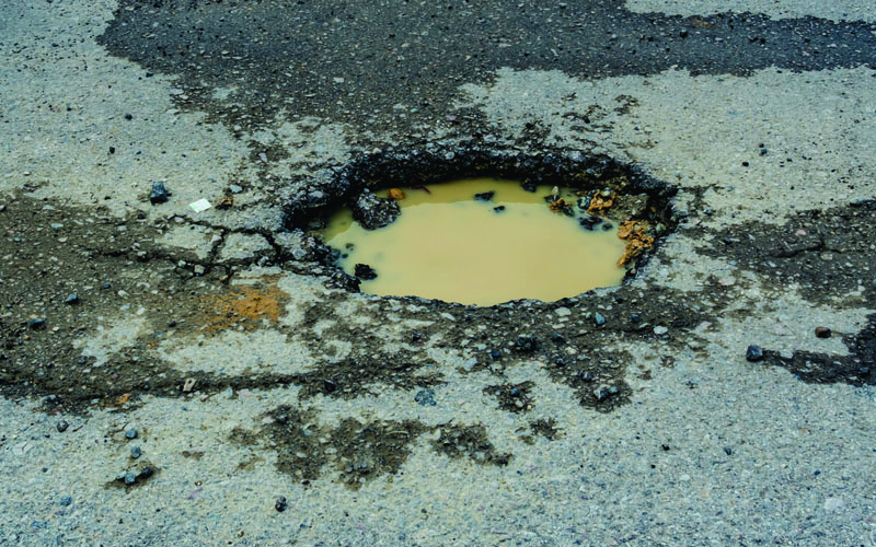 featured_0000_Free Guide_ Fixing Commercial Potholes Property Manager