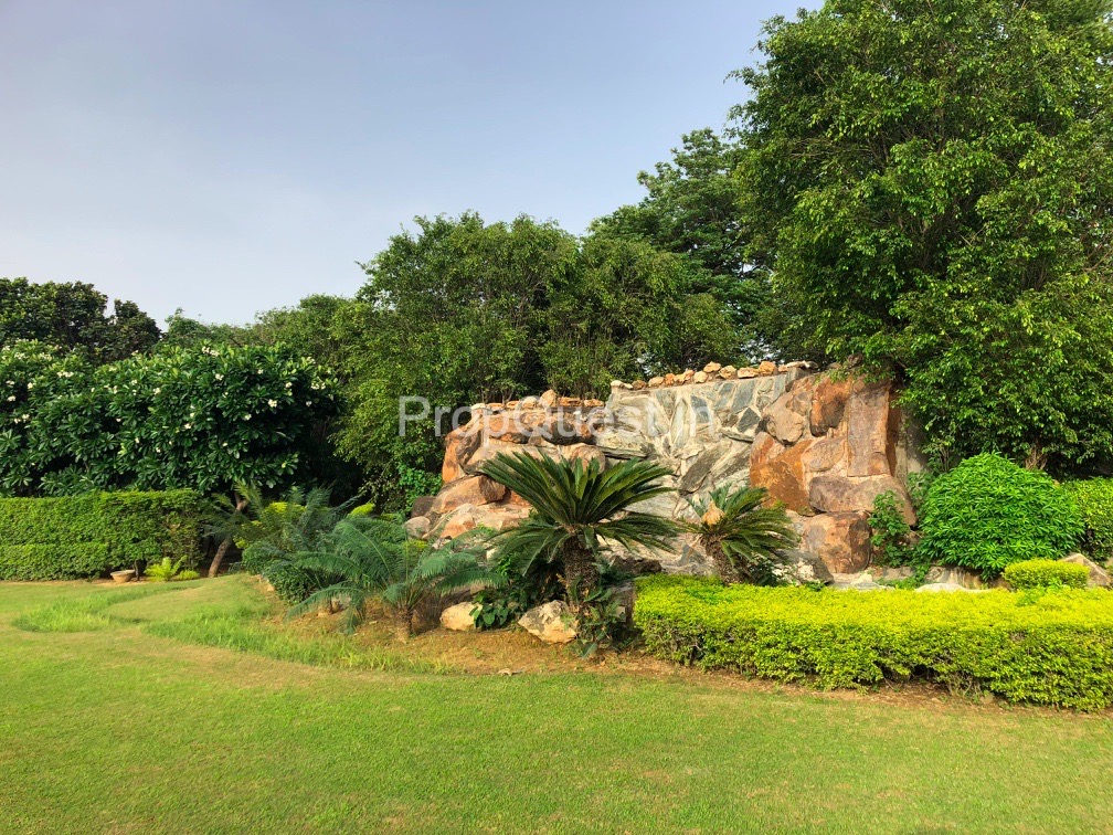 Luxurious 2.50 Acres Newly Built Farmhouse on Sale in Gulmohar Avenue