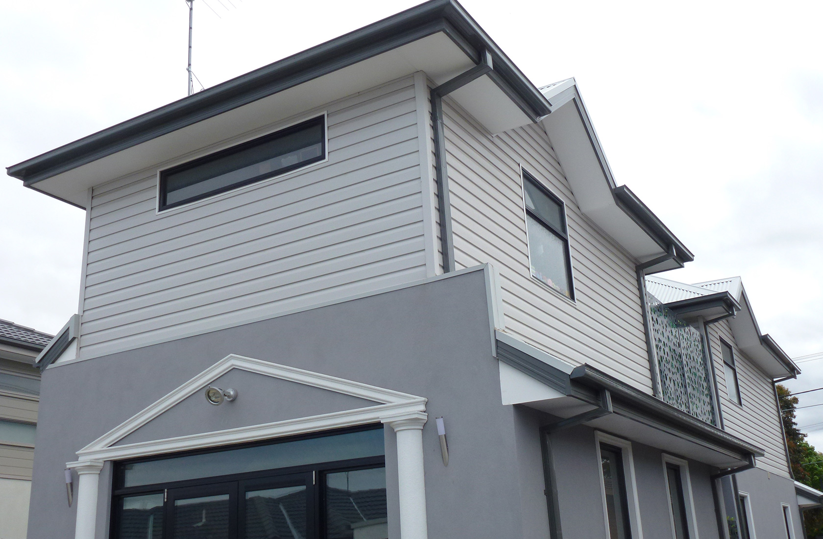 Newport Cladding Installation on Townhouses Vinyl Weatherboards