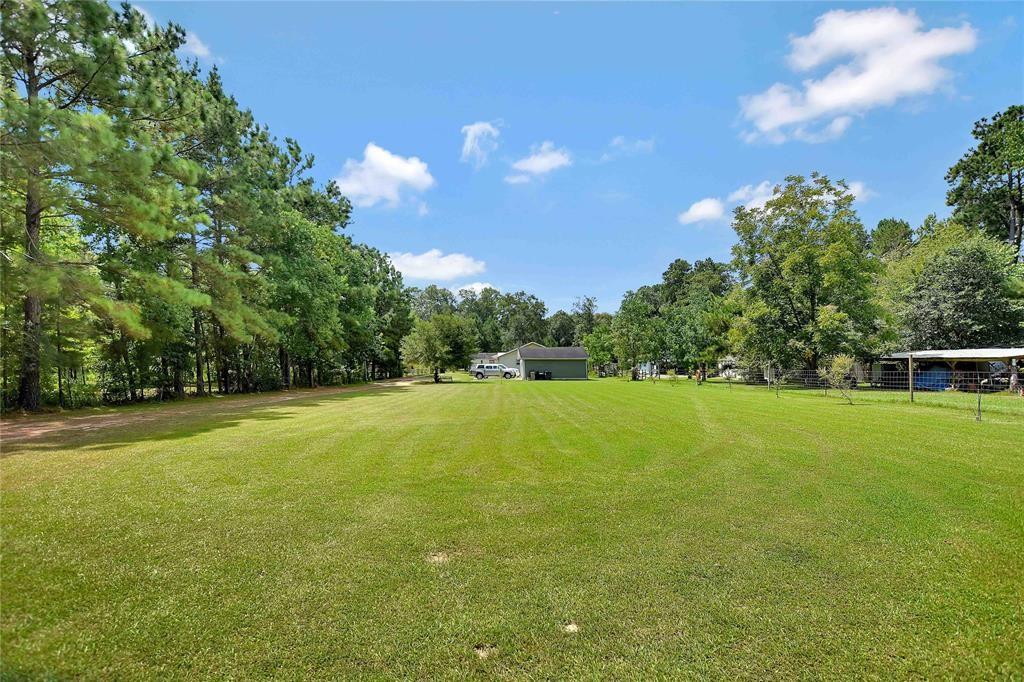 24395 Creekwood Dr, SPLENDORA, TX 77372