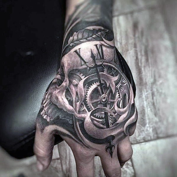 25 Frighteningly Cool Skeleton Hand Tattoo Designs 374_x_374_jpg