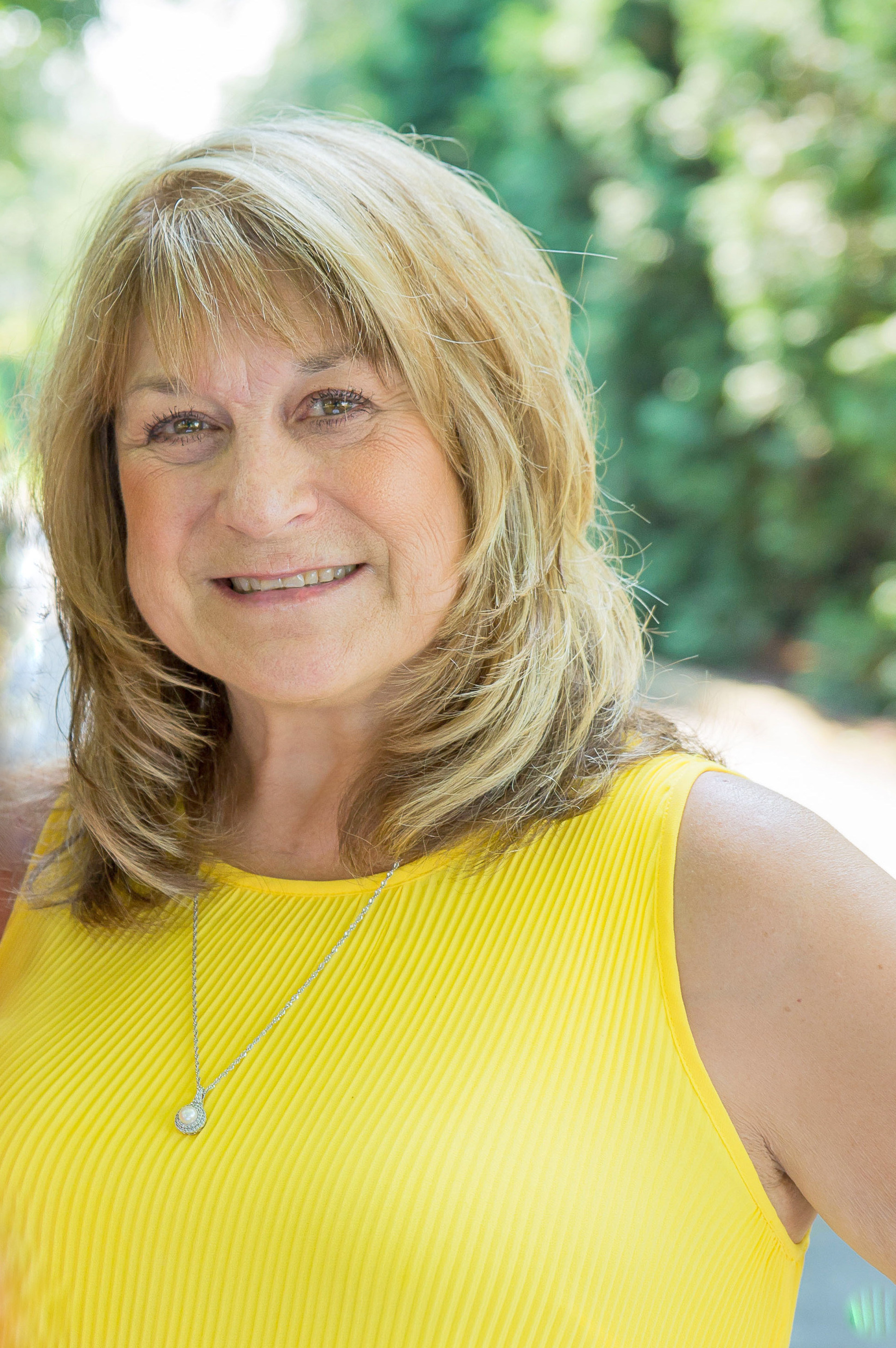 Susan M Thompson — Purdy Realty, LLC