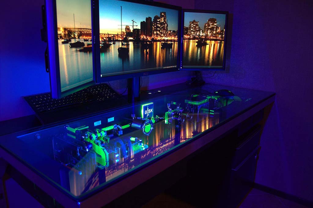 A workspace with custom PC built inside an incredible desk