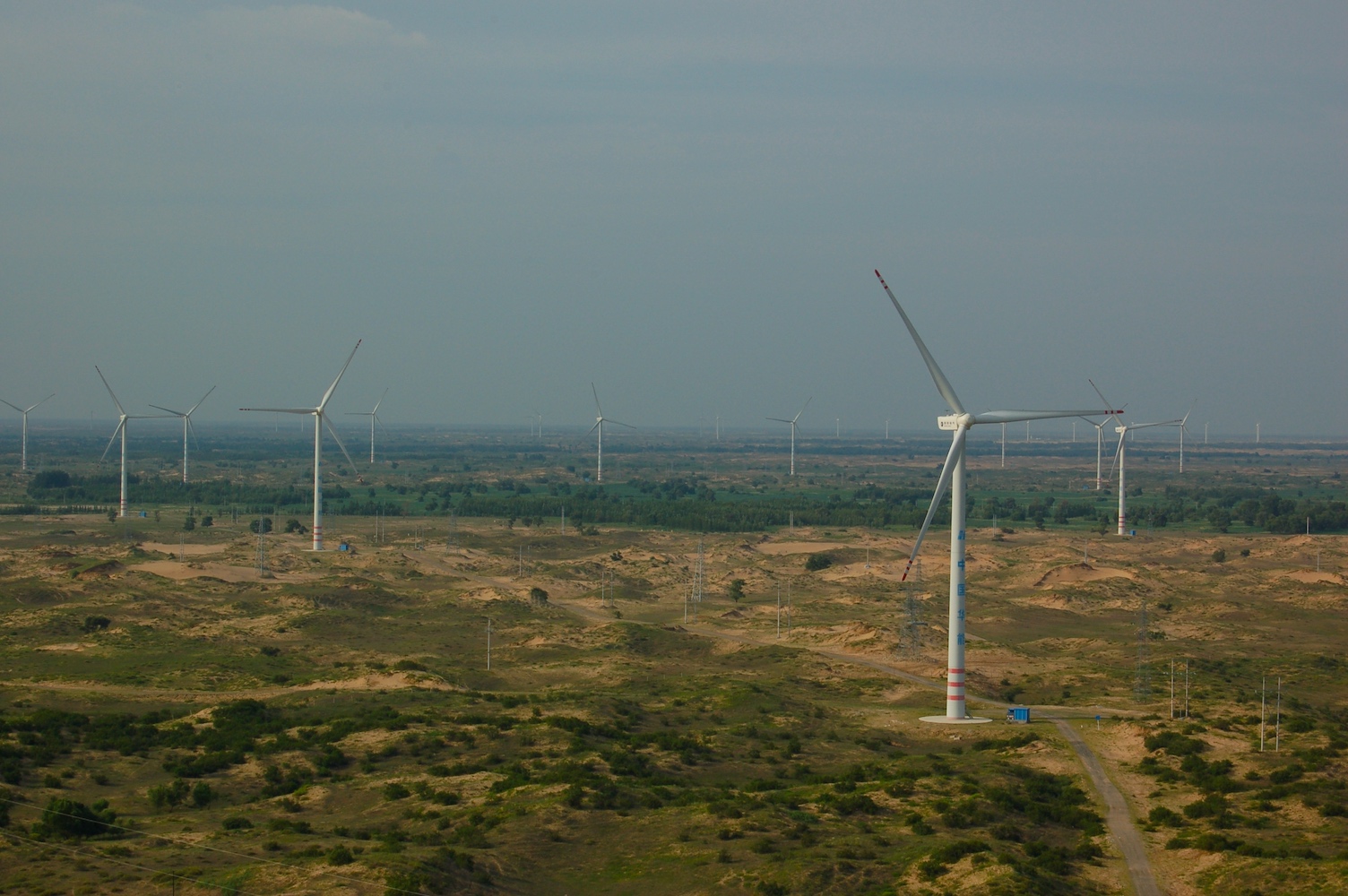 Spatially resolved land and grid model of carbon neutrality in China