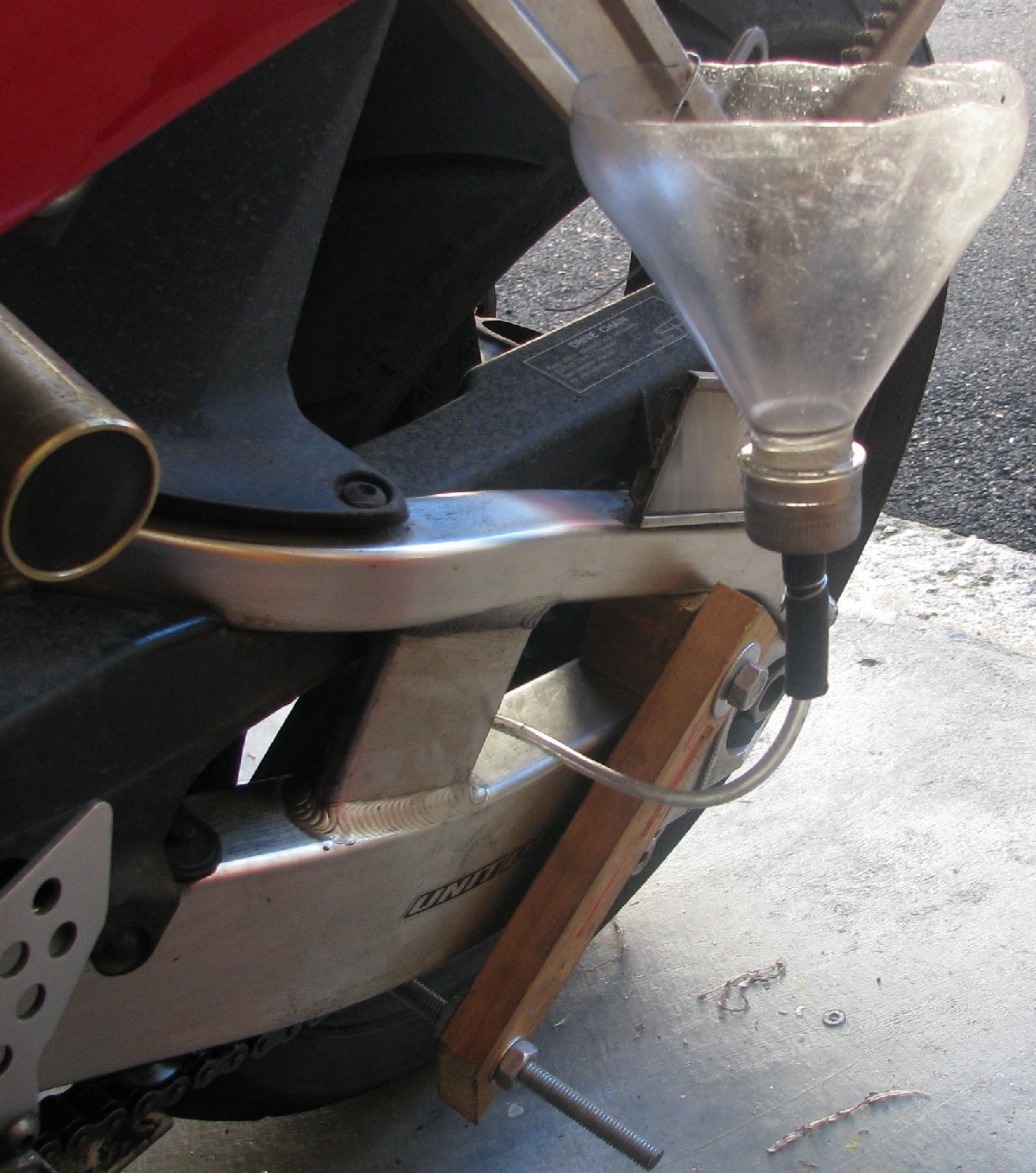 Motorcycle chain oiling system