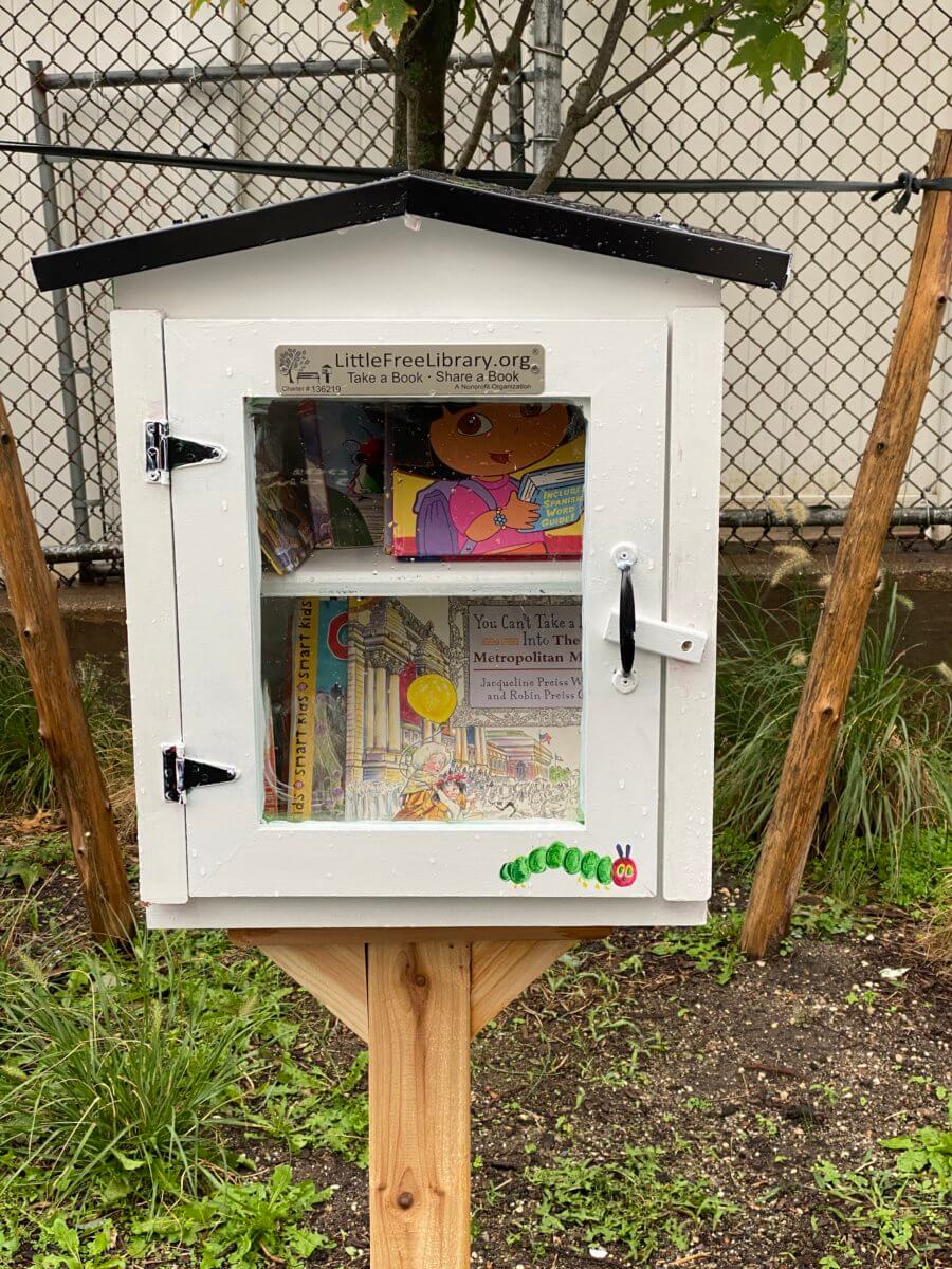 Flushing teacher brings Little Free Library to school community