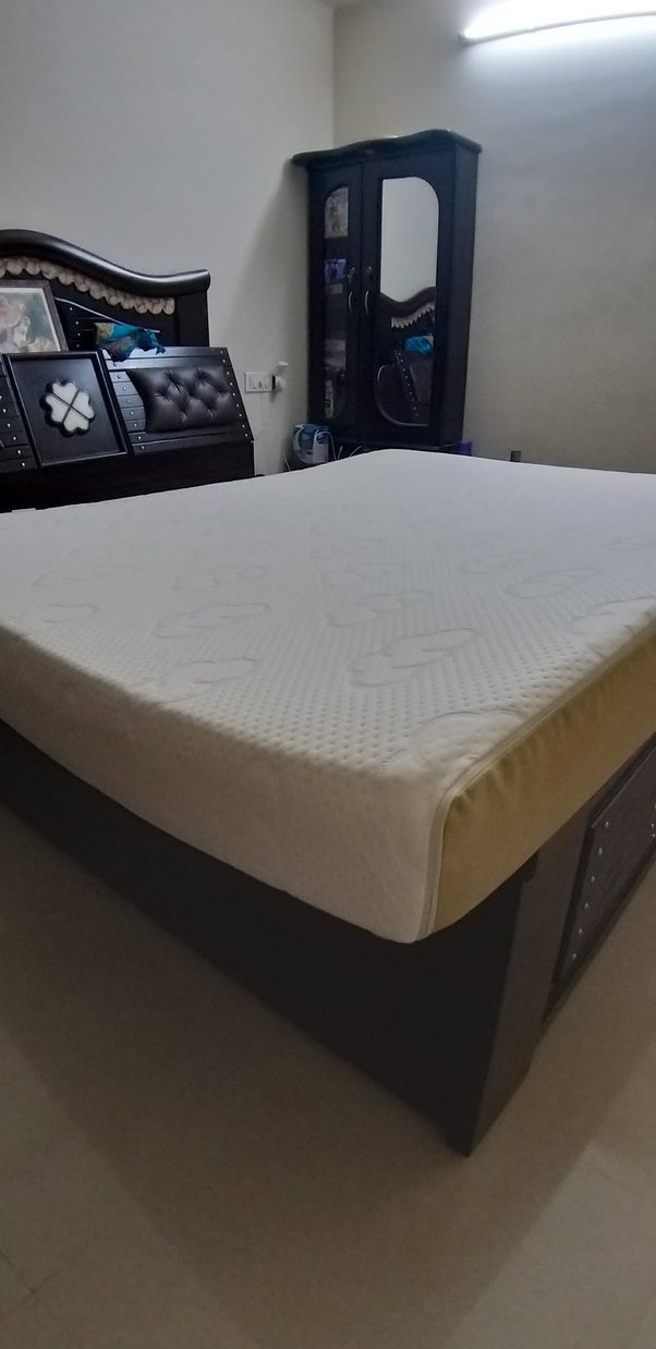 Is it okay to put a new memory foam mattress on top of an old spring