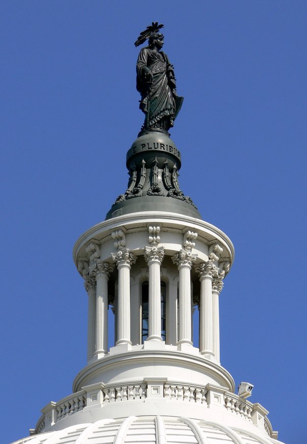 What are the symbols on top of the US Capitol building? Quora