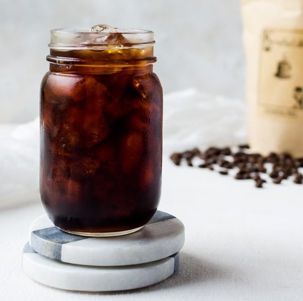 Why does cold brew tastes more concentrated (and better!) after filtering and sitting in the