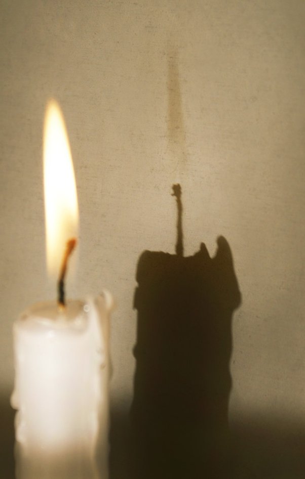 How far away can you see a candle flame at night? Quora