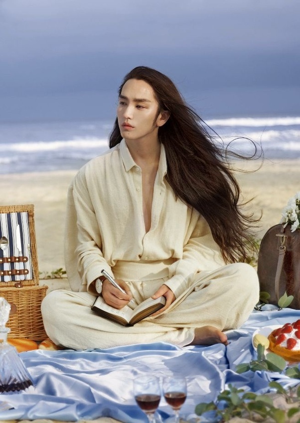 Why do Korean and Japanese men often wear long hair? Is it