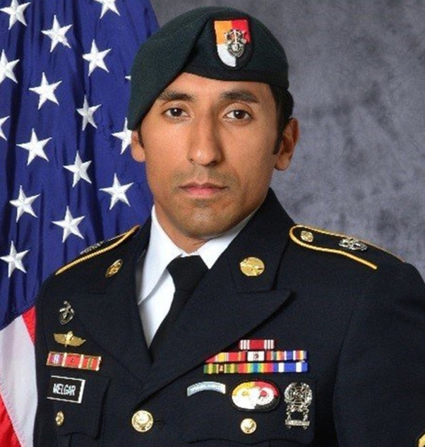 Why do some green berets officers have a different badge on their