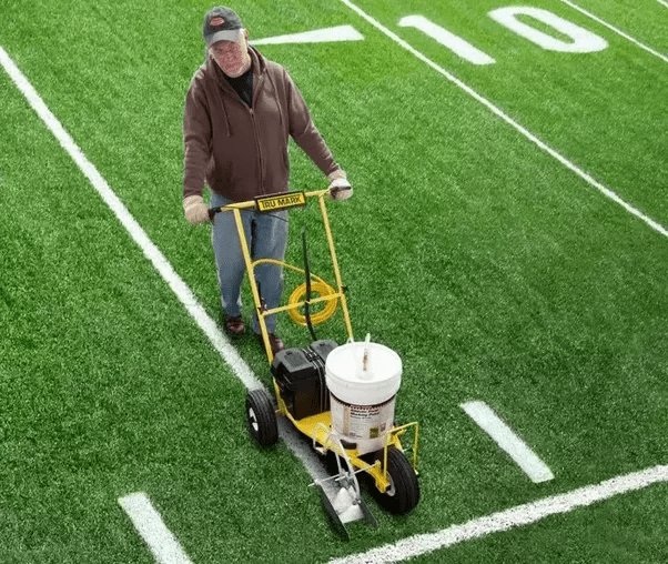 How do they get rid of the painted end zones of team names on American