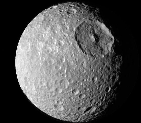 Is the impact crater on Vesta the tallest mountain in the solar system