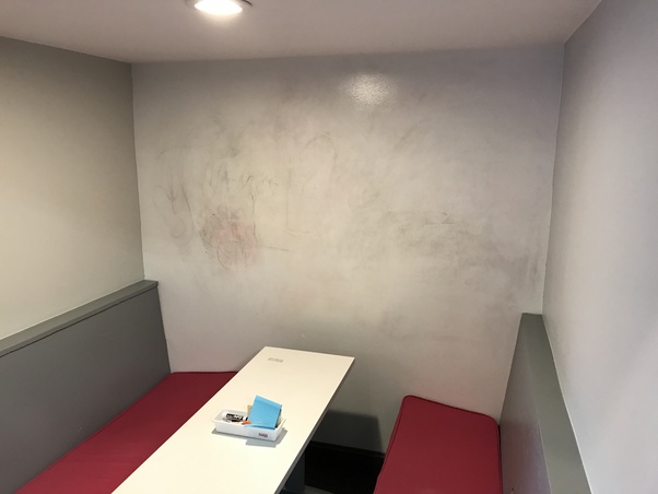 What are the advantages and disadvantages of whiteboard paint versus