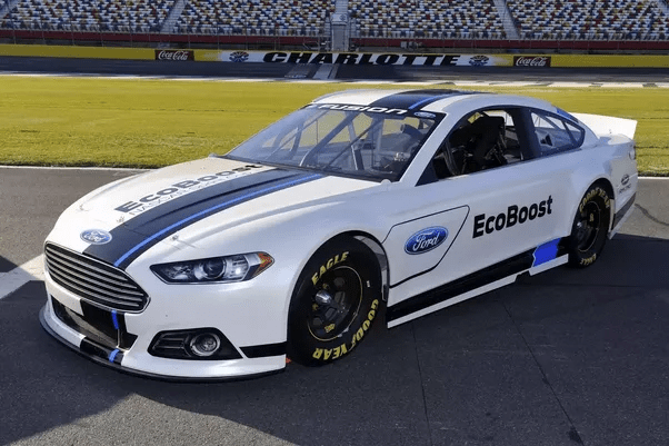 Why do race cars have stickers to make them look like normal cars? Quora