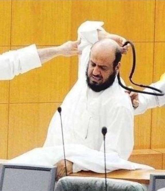 What is the black colored thing that Arabs wear on their head and looks