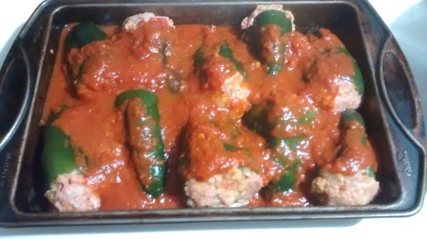 When making stuffed cabbage rolls, do you use uncooked rice? The recipe