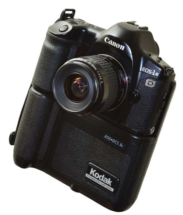 What are the mechanics behind the first camera invented and modern