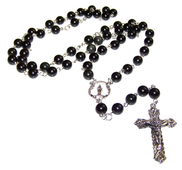 What is the necklace with a cross on it called? Quora