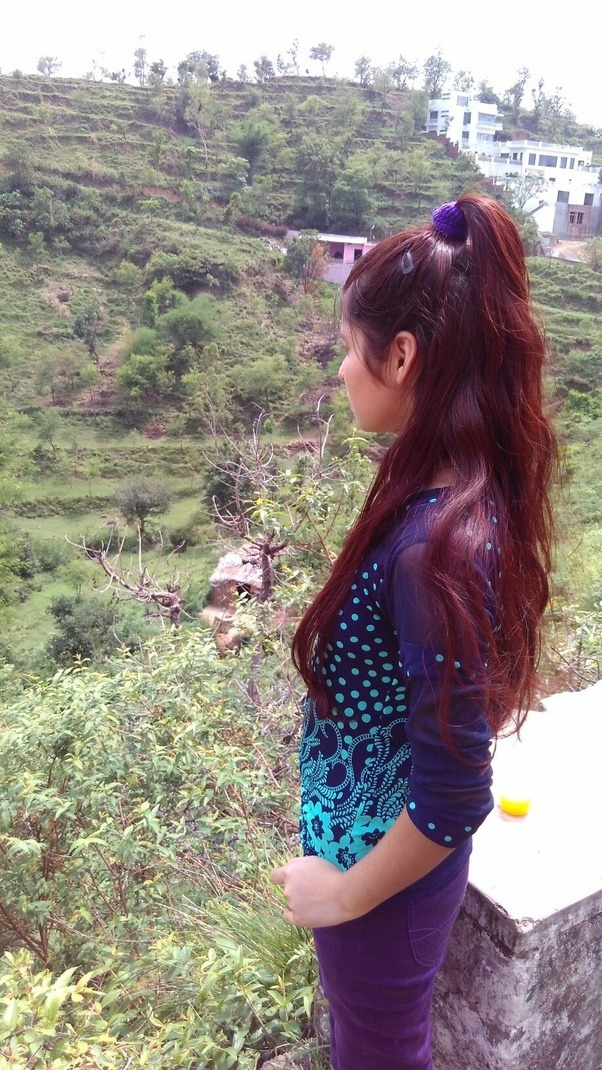 Why do some of us Indians have red or light color hair and