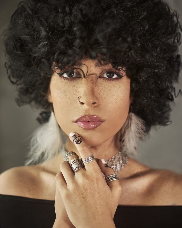 If I get a perm and I shower, will my hair go back to how