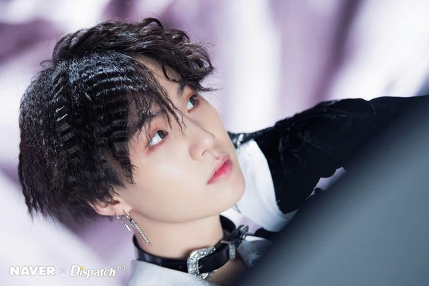 How many piercings does BTS Jungkook have on his left and right ear
