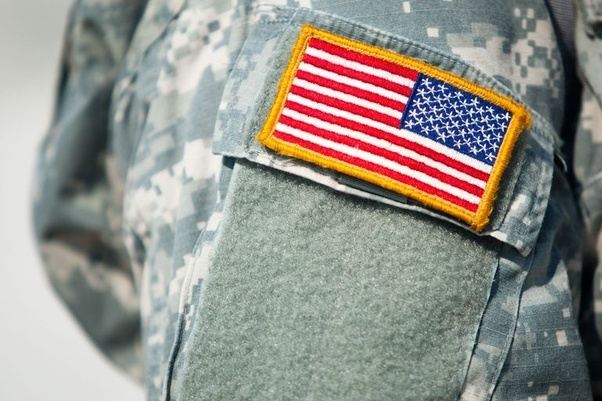 In the movie Suicide Squad, why is Captain Rick Flag's American flag